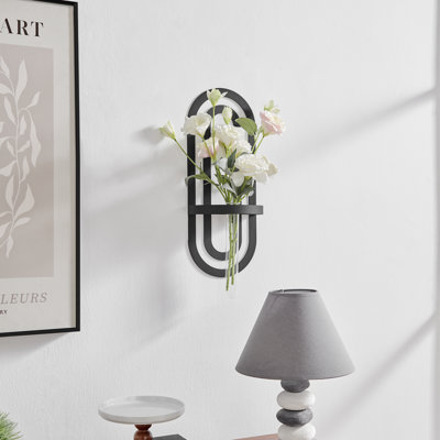 Vase mural en métal noir
