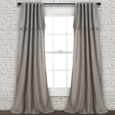 Paire de rideaux unis semi-transparents avec passe-tringle