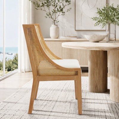 Fauteuil en rotin avec structure en bois et revêtement en lin