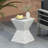 14.25" Natural Wood Grain Finish Prismatic Symmetry Concrete Outdoor Side Table with Symmetric Design – Weather-Resistant Accent for Patio, Garden, or Balcony