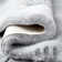 Khyrie Solid Color Machine Woven Shag Faux Fur Area Rug in Light Gray