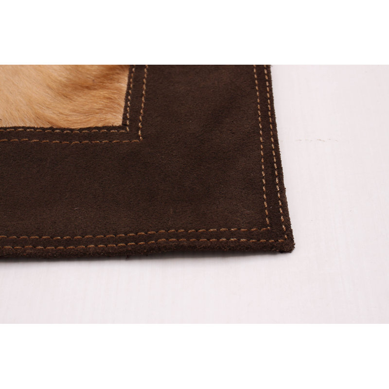 Sibell Cowhide Patchwork Indoor Rug