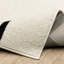 Tapis ivoire / noir moderne Hennings-1938255020