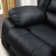 Lamyiah 77.6'' Wide Soft Vegan Leather Manual Reception Loveseat with Cup Holders and Console