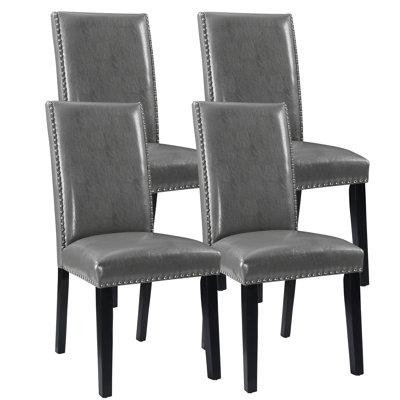 Ensemble de 4 chaises de salle à manger parsons rembourrées en similicuir avec garniture cloutée et pieds en bois massif LUMera Collection