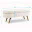 Banc ottoman de rangement ovale avec pieds en bois d'hévéa, tissu beige, solution d'assise et de rangement polyvalente pour n'importe quelle pièce