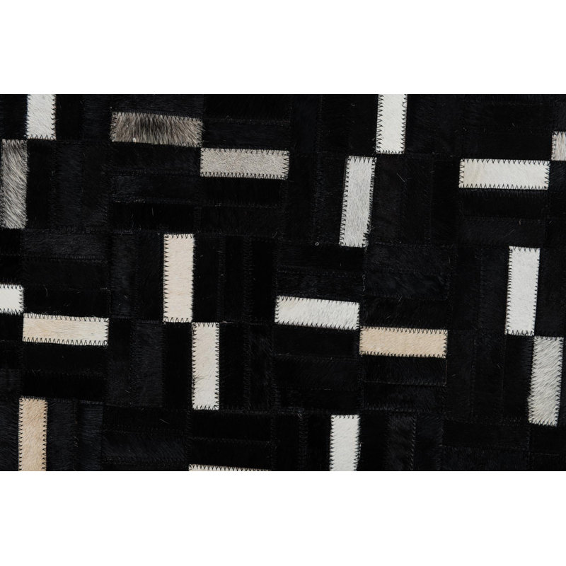 Tapis noir Isidore