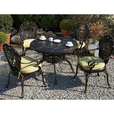 Fraire 4 - Person Patio Dining Set with Round Table , Cushions Included