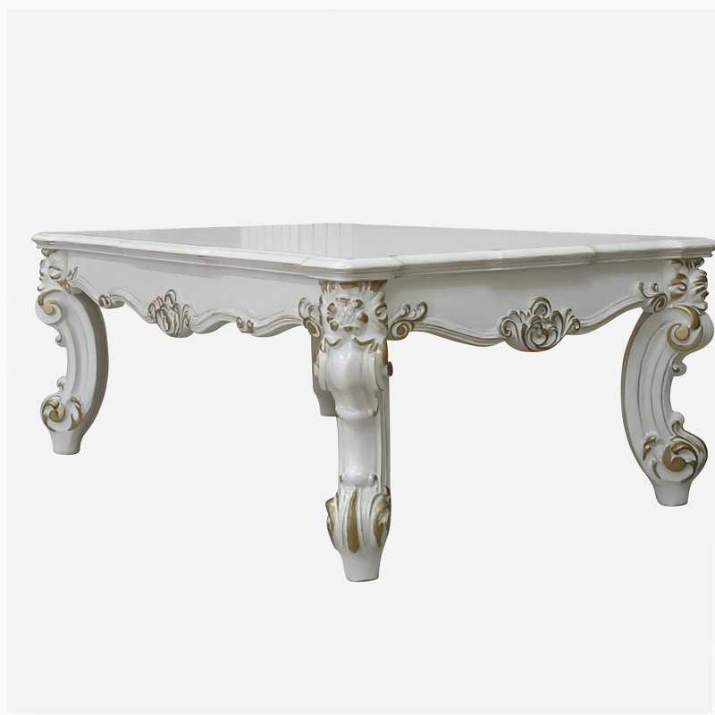 Table basse en perle antique avec pieds en volute