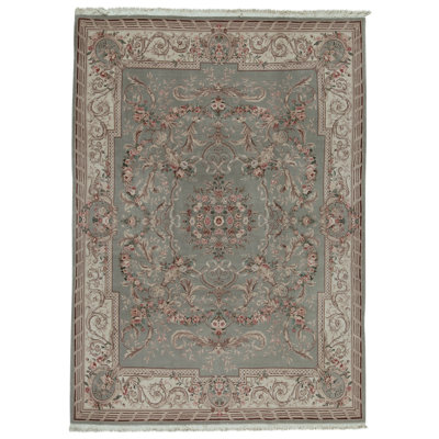 Tapis vert clair et crème noué à la main de haute qualité