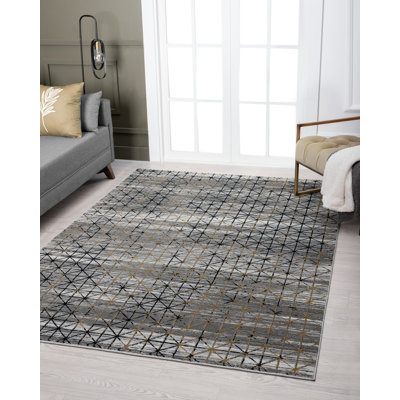 Tapis géométrique doré / gris