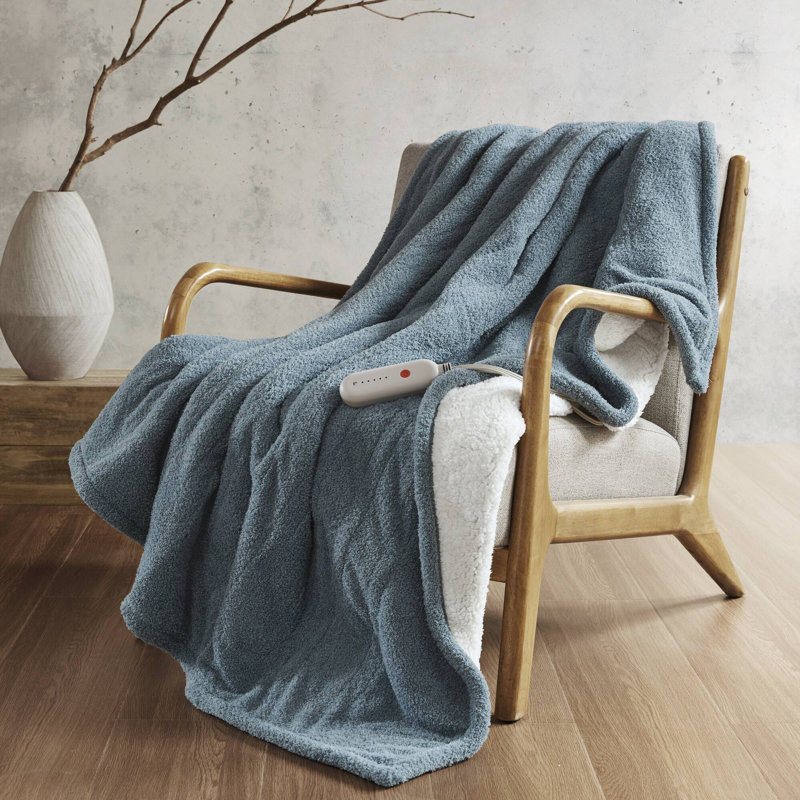 Luxueuse couverture chauffante confortable en polyester au design moderne pour la maison