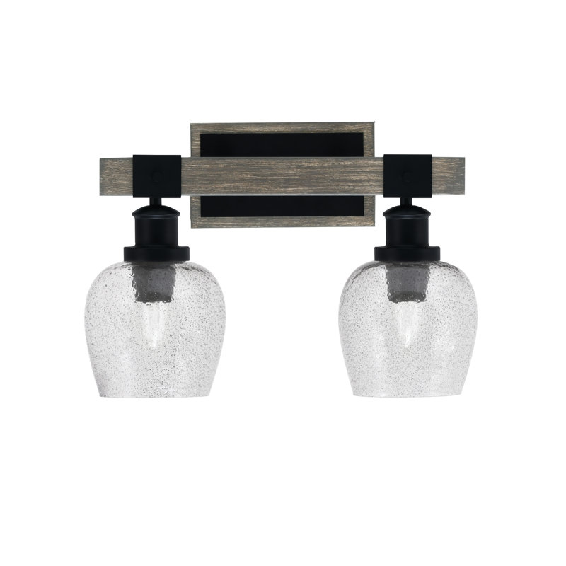 Barre d'éclairage de salle de bain 2 lumières Bitner présentée en noir mat et finition en métal d'aspect bois patiné peint avec verre de 6 po