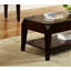 Table basse à finition noyer avec plateau