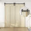 Ensemble de quincaillerie de porte de grange double porte pliante bi-pliante-104651686