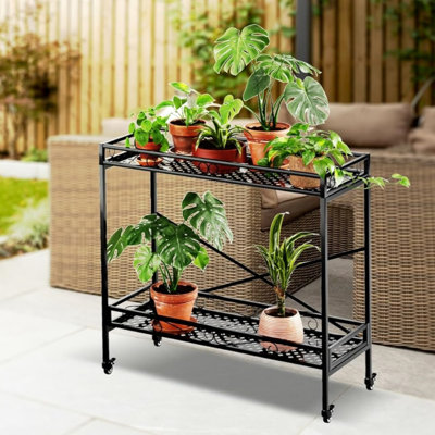 Support pour plante robuste en métal à 2 niveaux roulants, présentoir pour plantes d'intérieur / extérieur avec roues