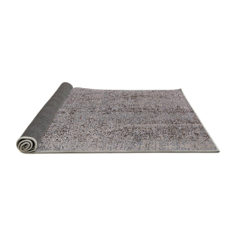 Tapis gris, Rond 7 pi