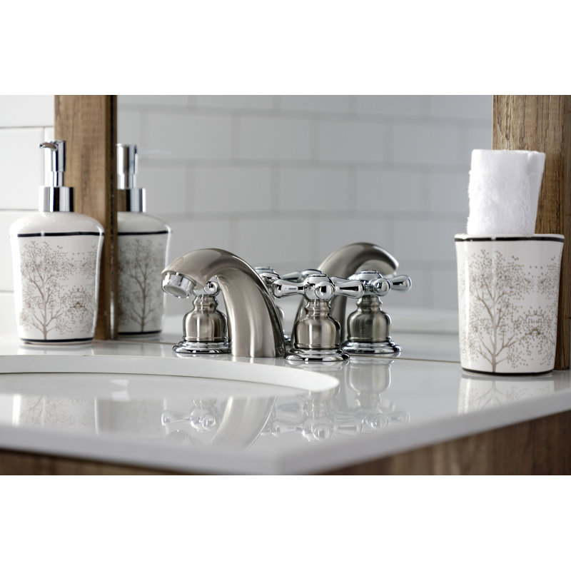 Kingston Brass Victorian Two-Handle 3-Hole Deck Mount Mini-Widespread Bathroom Faucet with Plastic Pop-Up