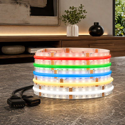 Flexible 16.4FT RGBCCT COB strip operating at DC24V, with UL Listed construction, 960LED/m, RGB plus tunable white from 3000K-6000K, color changing, and a 12mm width for home lighting. Adapter and controller are not included.