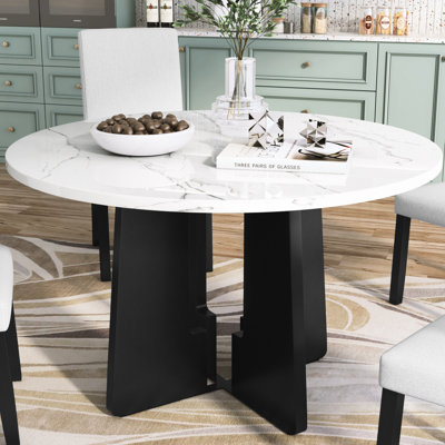 Table de salle à manger ronde avec base robuste
