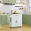 Îlot de cuisine polyvalent avec rangement, chariot roulant, prises de courant, ports USB et porte-serviettes et porte-épices pour les cuisines modernes-292600490