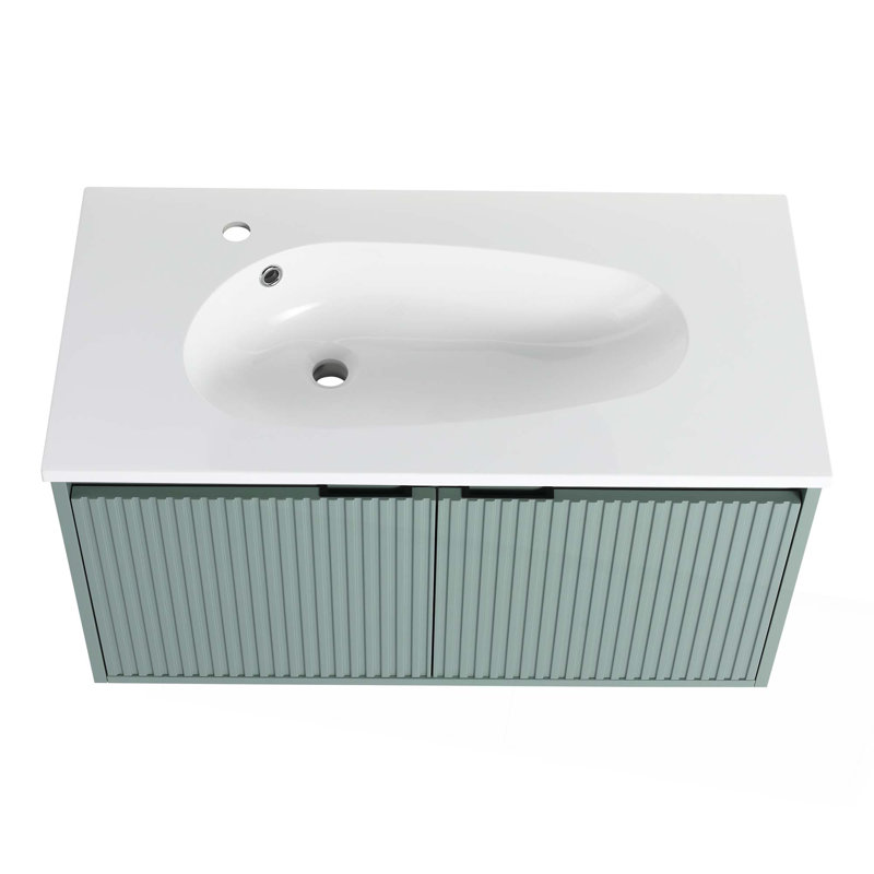 Meuble-lavabo flottant avec lavabo en résine en forme de goutte