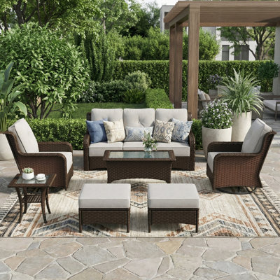 7 Pieces Outdoor Wicker Swivel Chair Set With Cushions, Coffee Table, Ottomans
