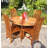 Warner Round Teak Folding Outdoor Dining Table With Umbrella Hole , 47'' in. W 47'' in. D