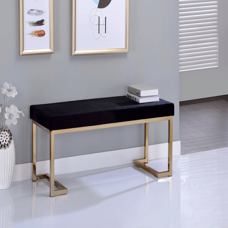 Banc rembourré en tissu et finition champagne