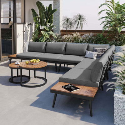 Ensemble de canapé modulaire d'extérieur avec tables polyvalentes et coussins confortables pour divers espaces