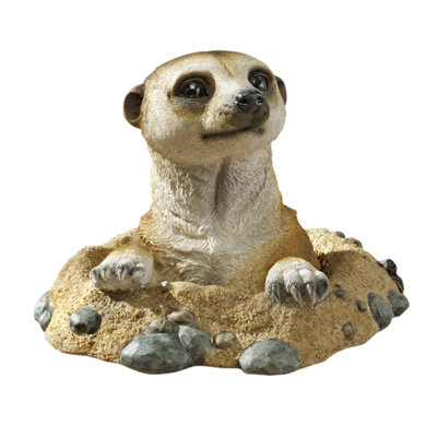 Statue suricate hors du trou Kalahari
