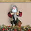 Figurine de père Noël à la mouche
