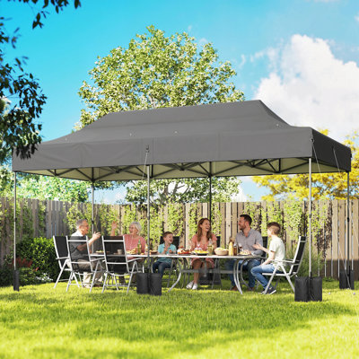 Tente 10 po x 20 pi avec auvent escamotable, abri portatif robuste pour l'extérieur avec sac de transport à roulettes UPF50 +, sacs de sable, hauteur réglable pour les fêtes, les événements, le camping, gris foncé