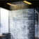 Polished chrome shower system with rainfall head and flexible handheld sprayer for comfort