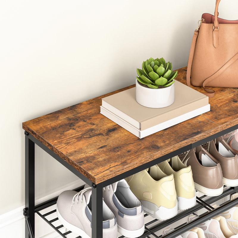 Le range-chaussures peut contenir 24 à 26 paires de chaussures