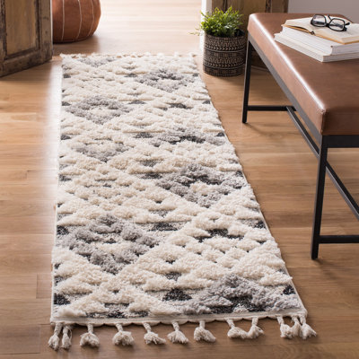 ImraanMoroccan Tassel Shag Geometric Indoor/Outdoor Rug