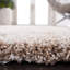Tapis à poil long de couleur unie Performance Angeliya-19276463