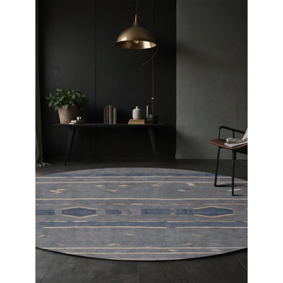 Tapis gris soyeux et moelleux