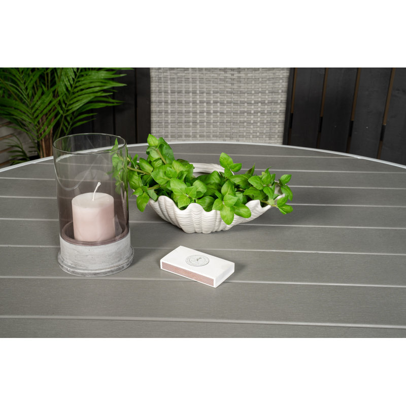 Akia 4 - Person Patio Dining Set with Extendable Round Table