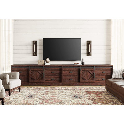 Yoleth Unfinished TV Stand for TVs up to 88" with Fireplace Included
