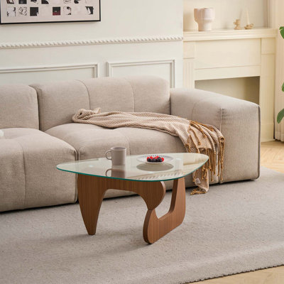 Table basse moderne avec plateau en verre, compacte et élégante pour les petits salons