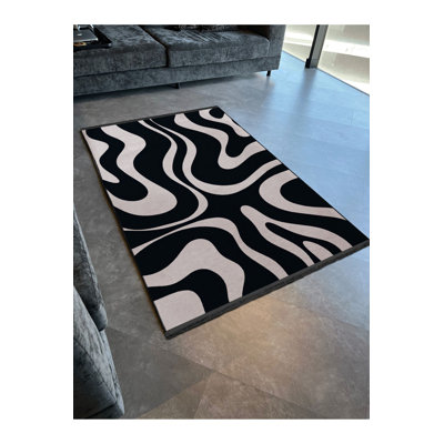 Tapis décoratif noir à motif zébré noir