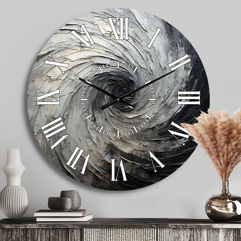 Horloge murale grise et noire, Médium