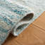 Tapis turquoise / ivoire en laine tissée à la main Pecktonville-78163636