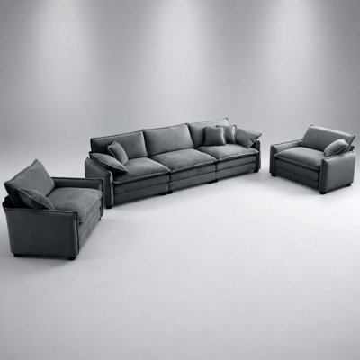 Ensemble de canapé chaleureux et confortable avec coussins moelleux et coussins décoratifs en velours côtelé gris, parfait pour les intérieurs modernes et rétro