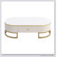 Table basse moderne ovale avec tiroirs spacieux, conception à profil courbé et décor en métal doré pour les salons élégants