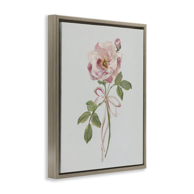 Bouton de rose rose avec ruban