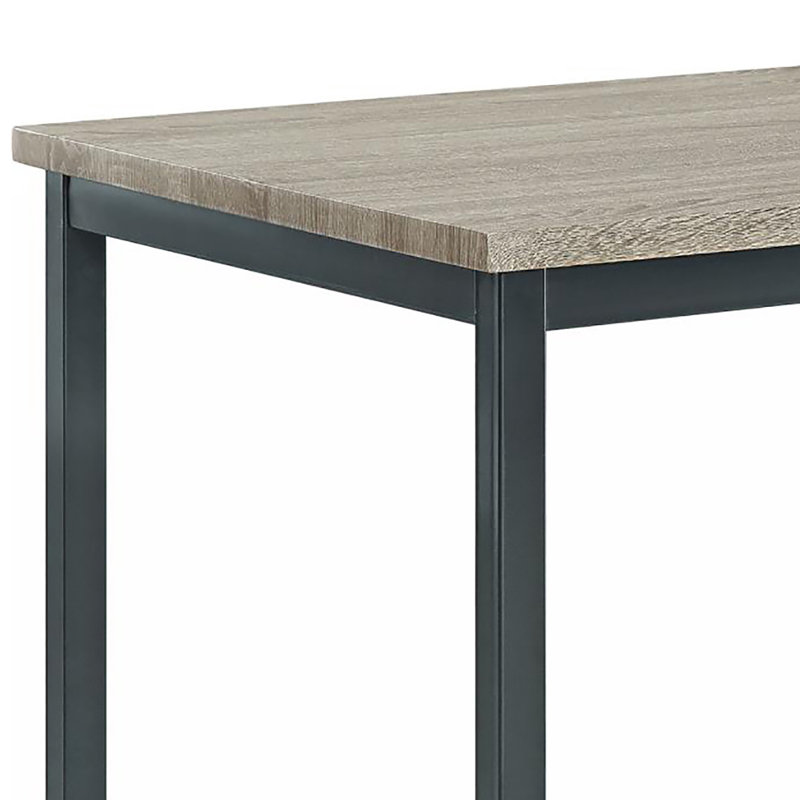 La table rectangulaire grise et noire, d'un poids de 44 lb, peut accueillir confortablement 4 personnes.