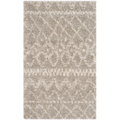 Quanah Geometric Hand Woven Area Rug