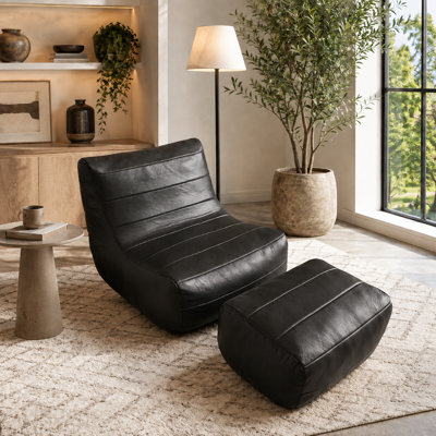 Fauteuil lounge d'appoint en similicuir de 83 cm de large avec repose-pieds